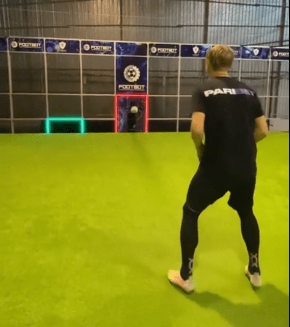 This training device helps soccer players aim their kicks.